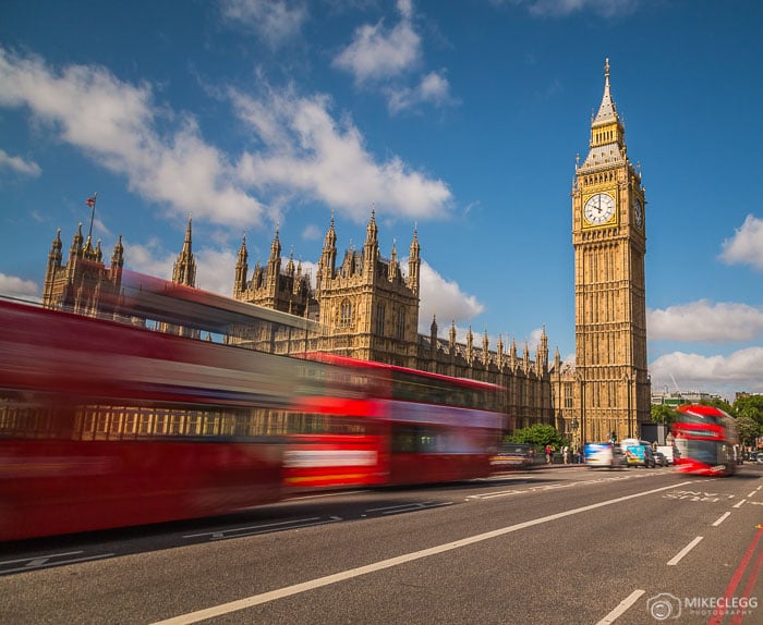 The Houses of Parliament in London showing Big Ben/Elizabeth Tower and traffic