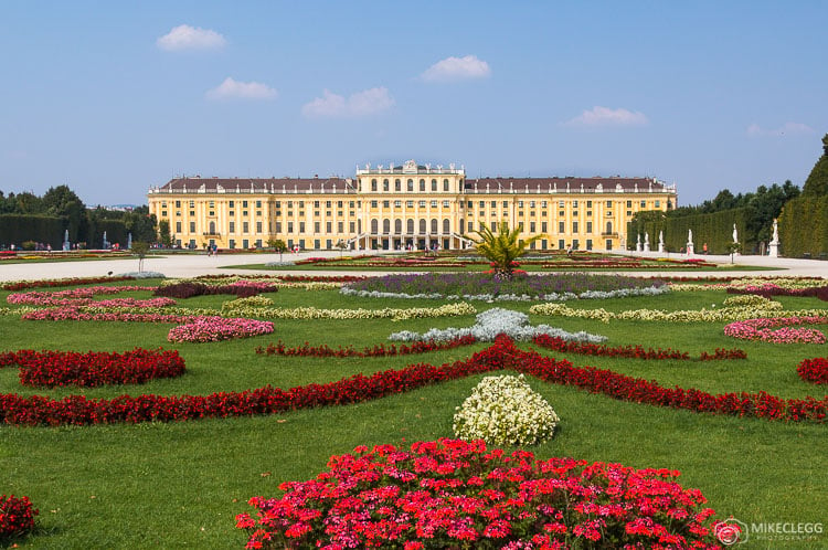 Schönbrunn Palace in the summer with flowers in the gardens