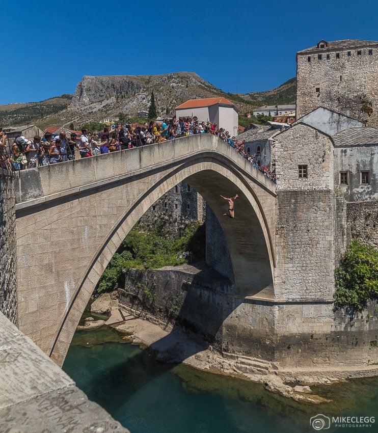 Jumpers performing along Stari Most Bridge