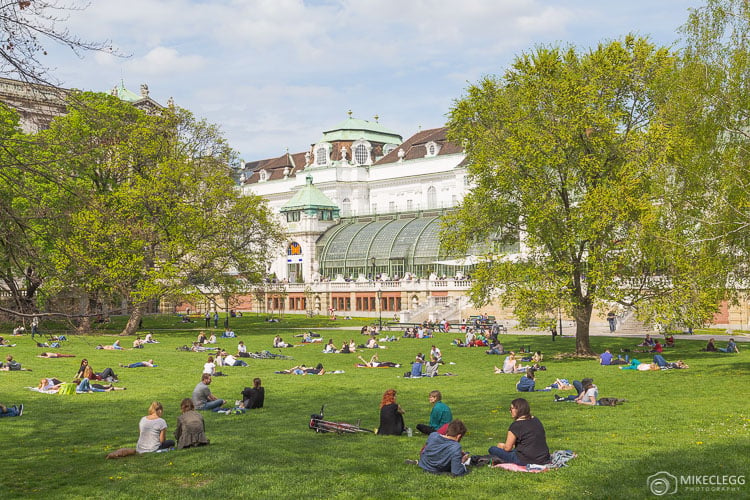 People relaxing in the Burggartenin Vienna in the summer