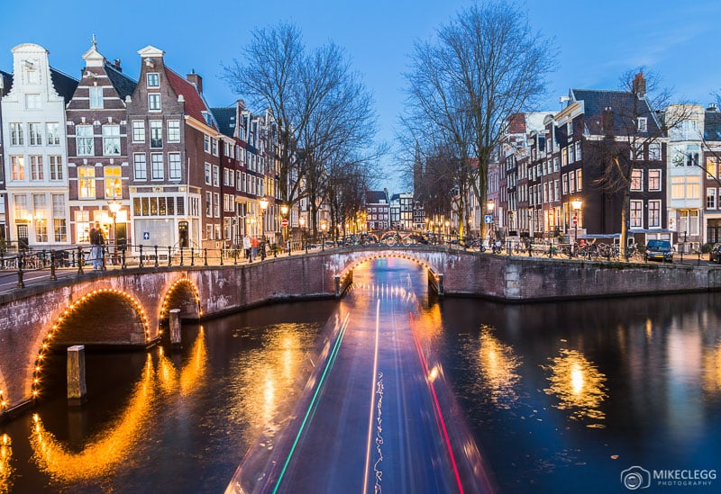 Canals and architecture in Amsterdam at night