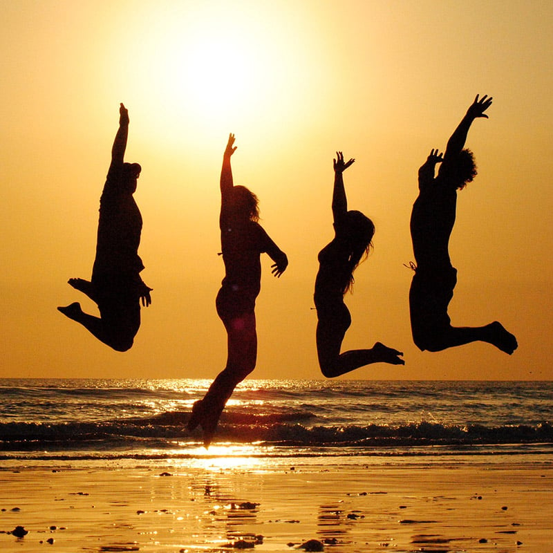Group holiday - Sunset on a beach - CC0 (Pixabay)