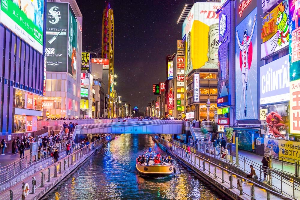 Dotonbori Canal in Osaka at night with colourful lights