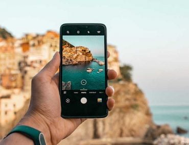 Taking pictures at a travel destination on a smartphone