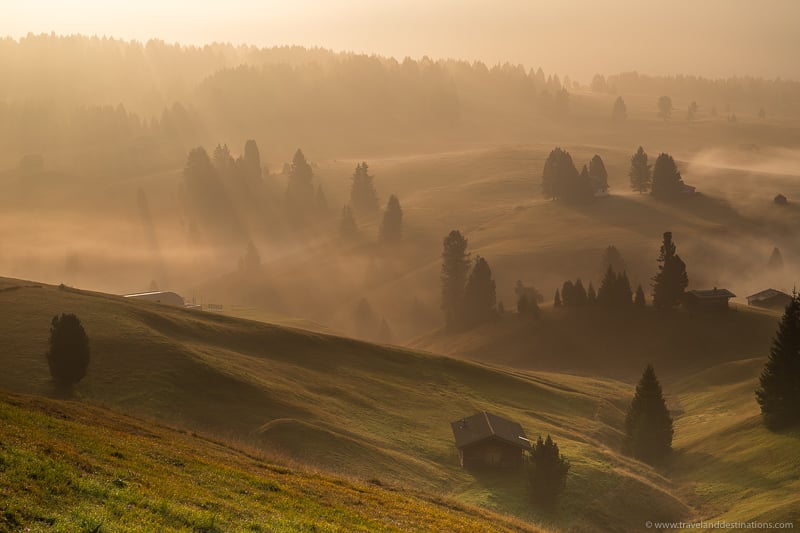 Seiser Alm at sunrise with beams of light