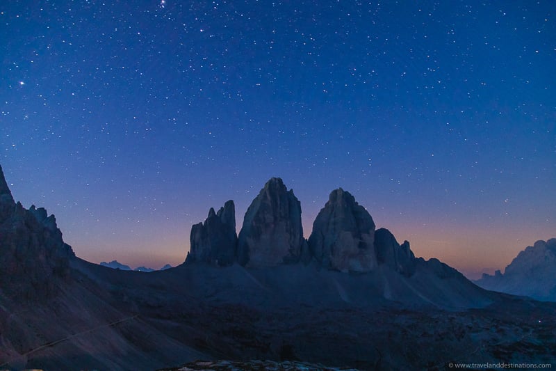 Tre Cime di Lavaredo at night with stars