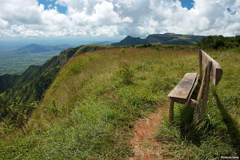 Edge of mountain side overlooking plains below