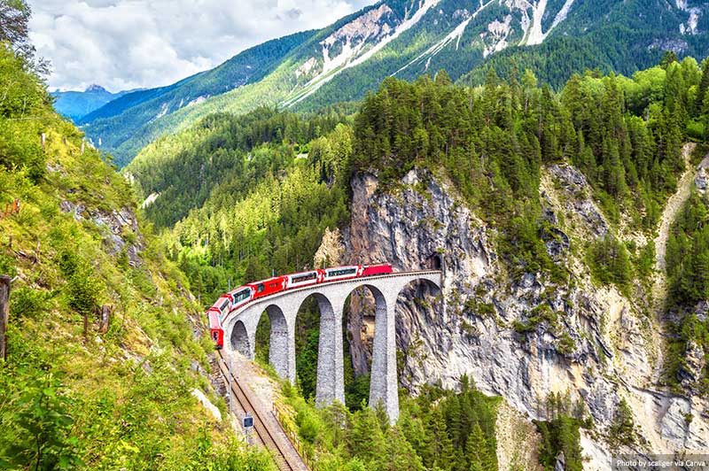 Landwasser Viaduct. Bernina Express on railroad bridge in Switzerland