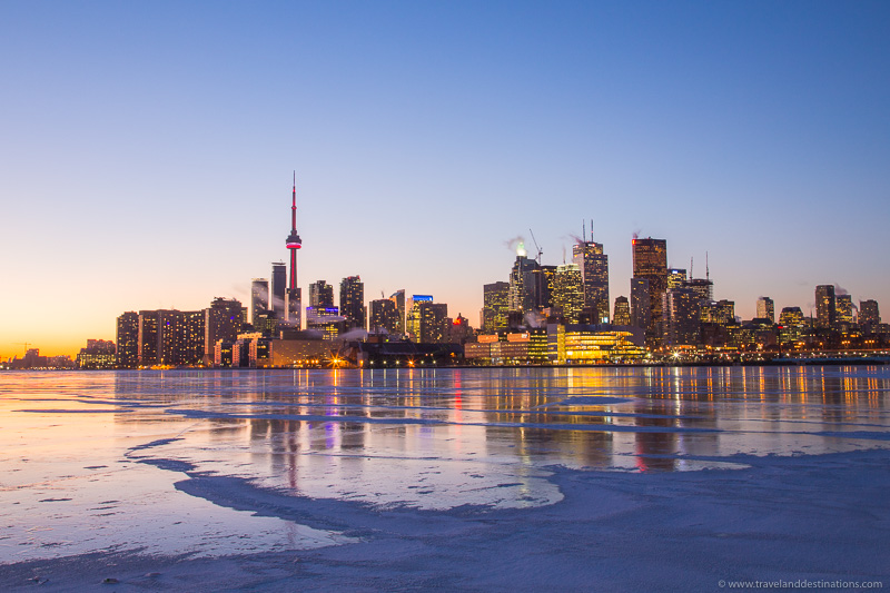 Toronto Skyline during the winter with a frozen lake