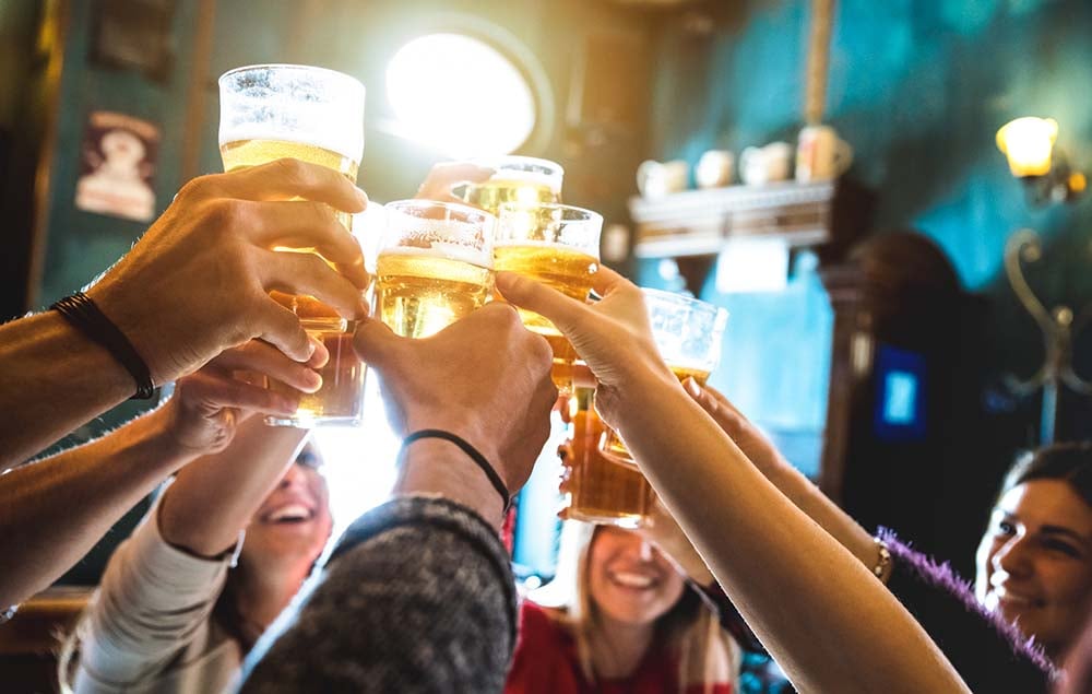 People toasting beer