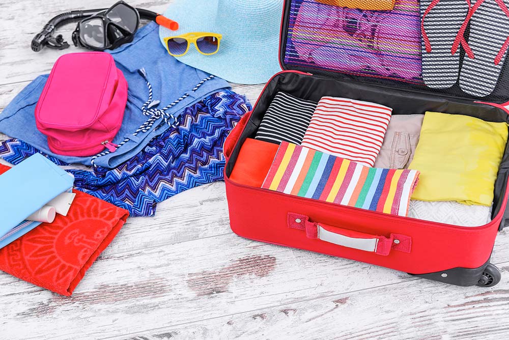 suitcase and beach items
